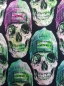 Preview: French Terry Totenköpfe mit Mütze - pink-grün auf schwarz